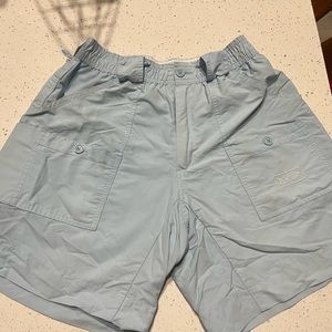 Means AFTCO shorts on light blue